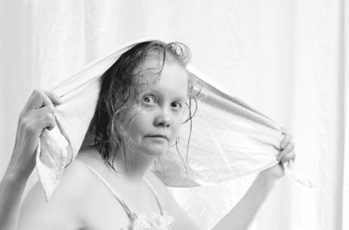 Black and white portrait of a cute and cheerful caucasian.